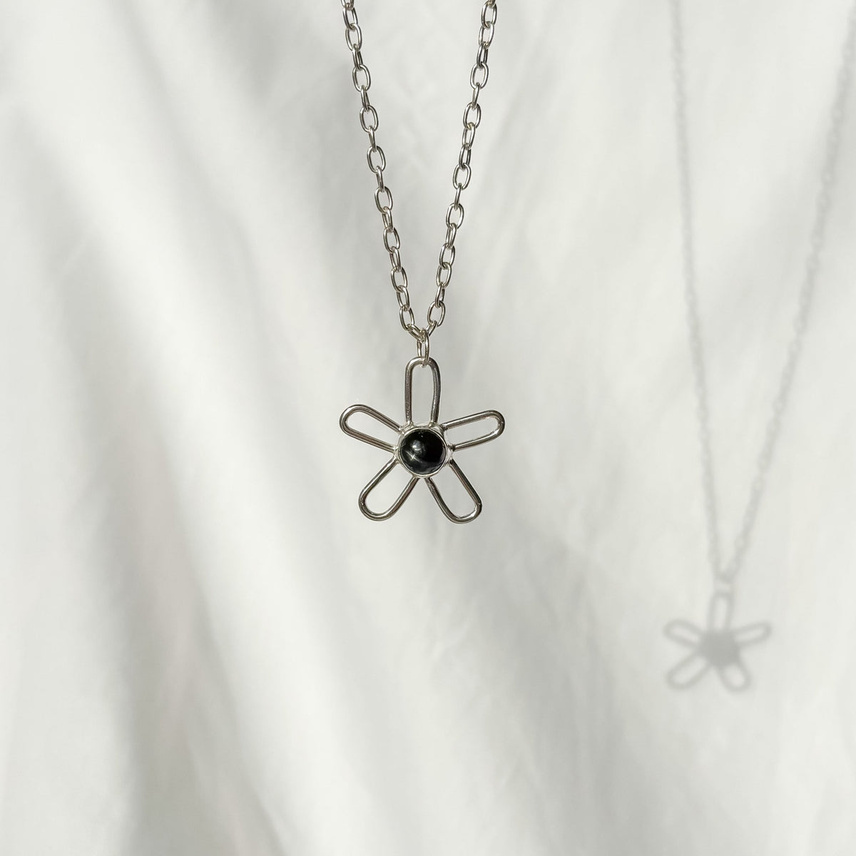 Diopside flower charm