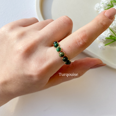 Braided wire ring with selected stone